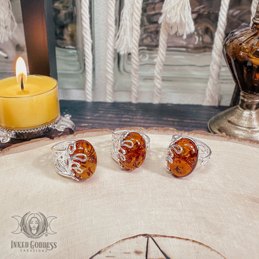 Tap into your personal power with the help of a Gold Amber Sterling Silver Ring from Inked Goddess Creations.